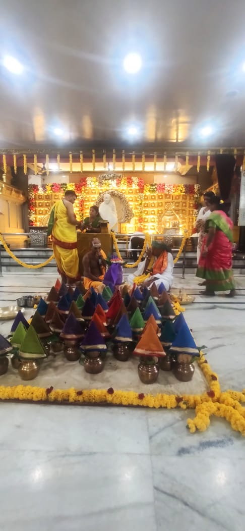 Temple Interior - Devotees in Prayer
